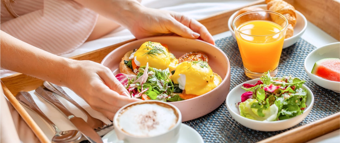 Female patient eating healthy food in hospital bed after surgery